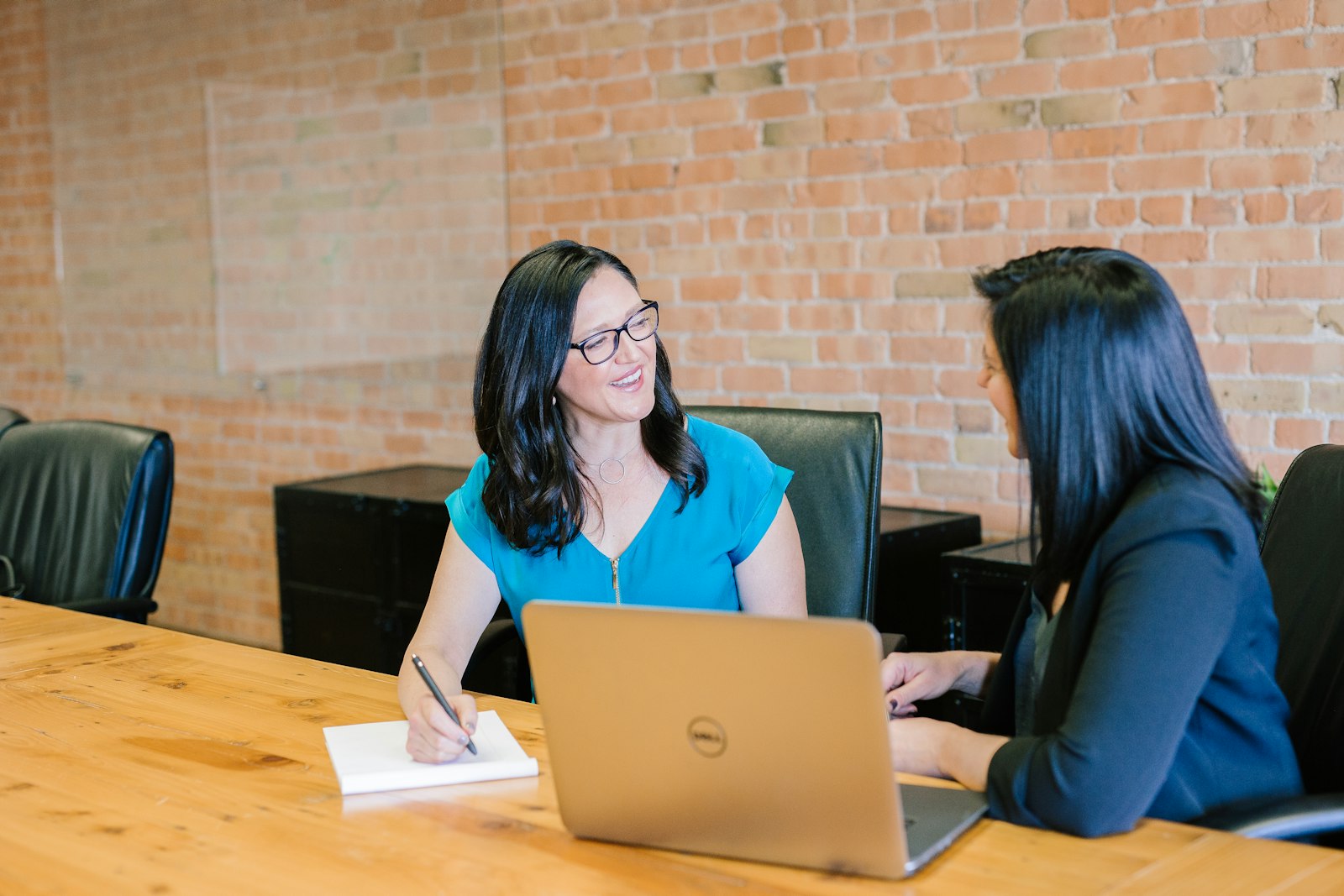 A consultant reviewing plans with a client