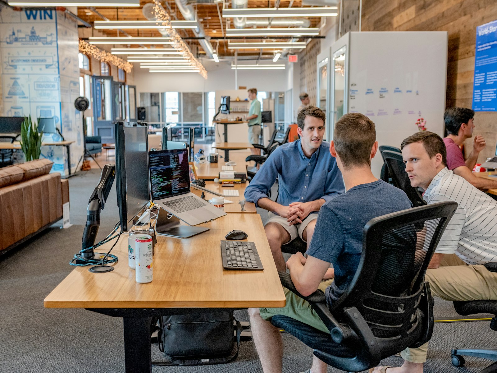 A team collaborating in an open-plan office